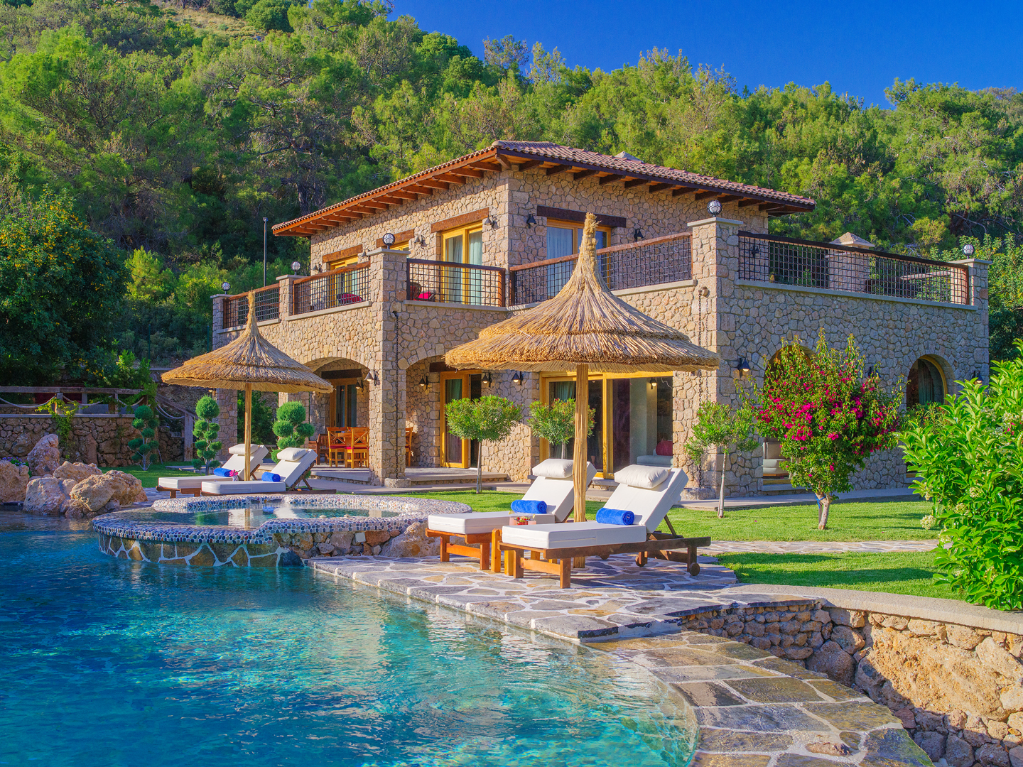 Villa elmali stone facade poolside