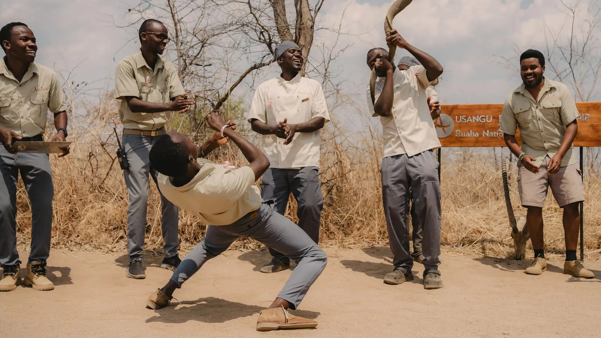 Asilia africa usangu expedition camp staff dancing jpg